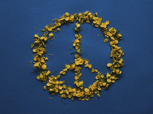 peace sign in blue and yellow, the colors of the Ukrainian flag.