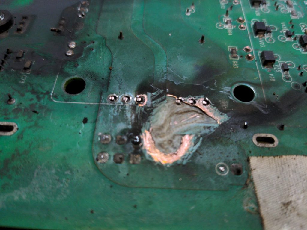 an image of burntout printed circuit boards.